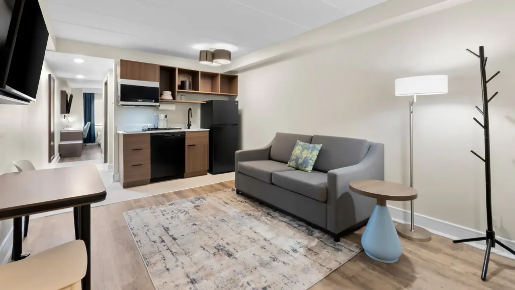 a living room with a couch and a small table