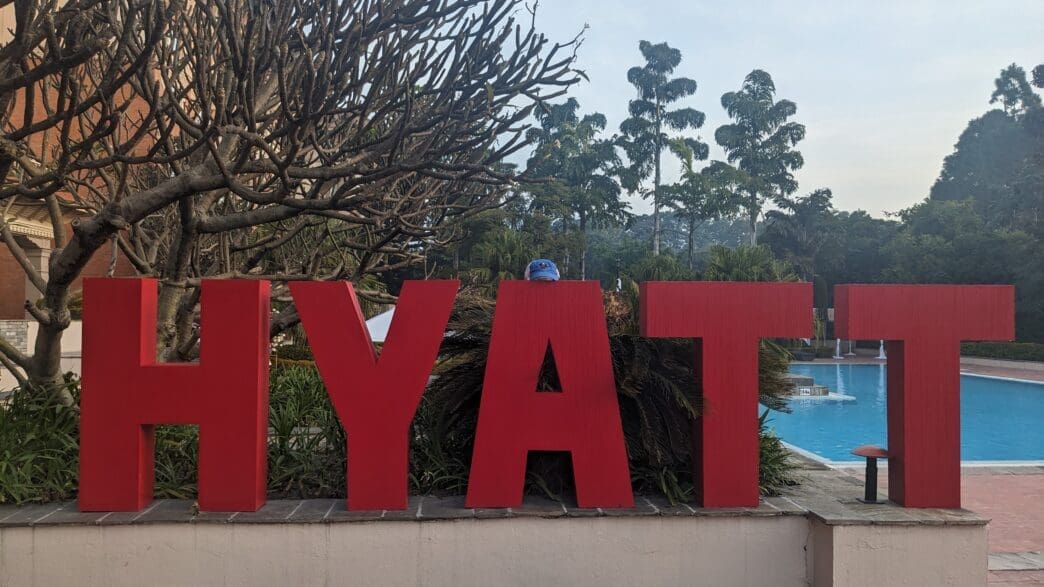 a large red sign on a wall