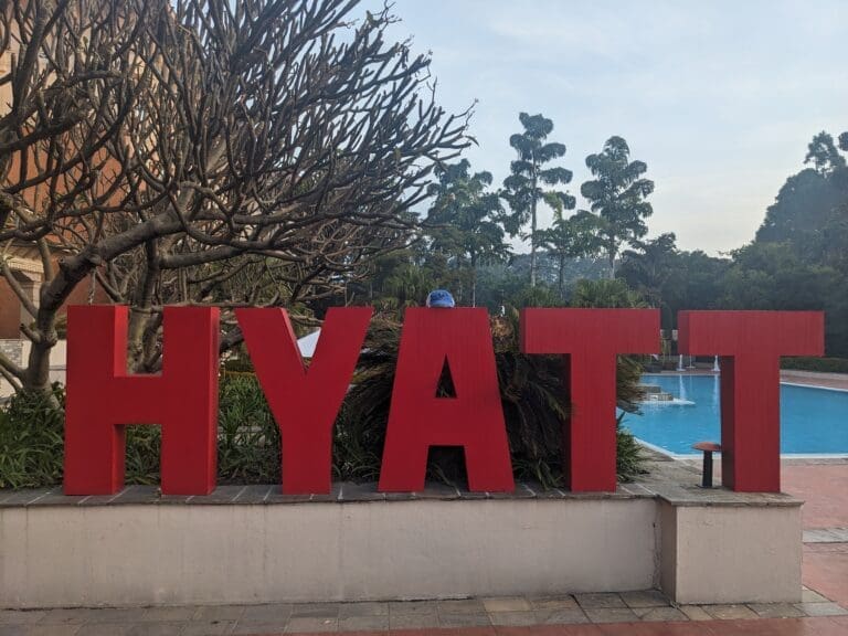 a large red sign on a wall