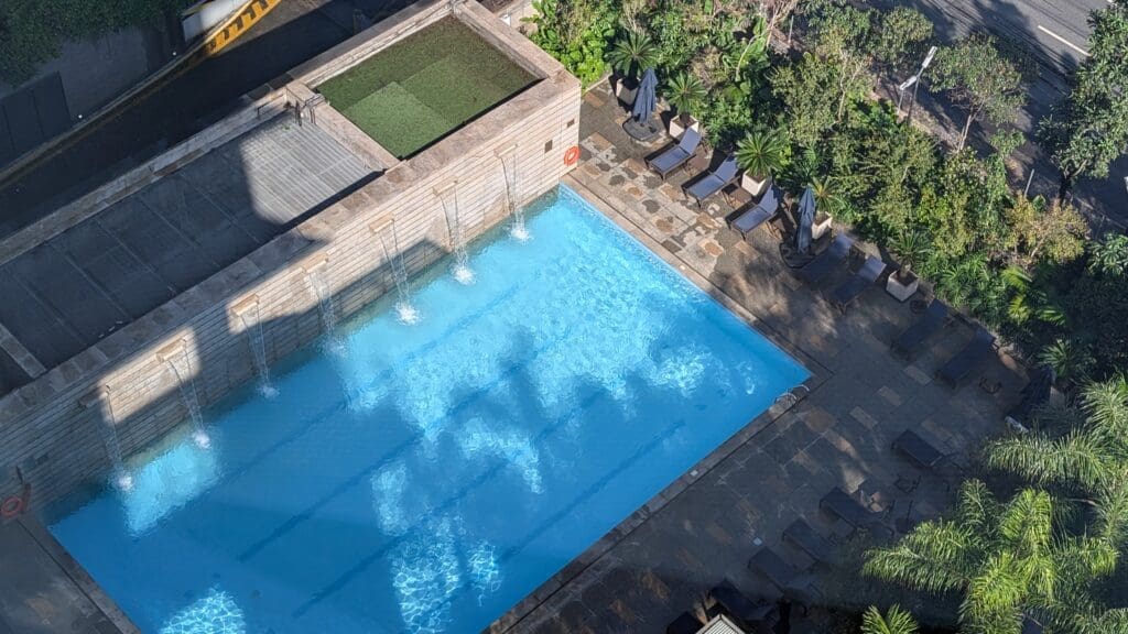 a pool with water falling out of it