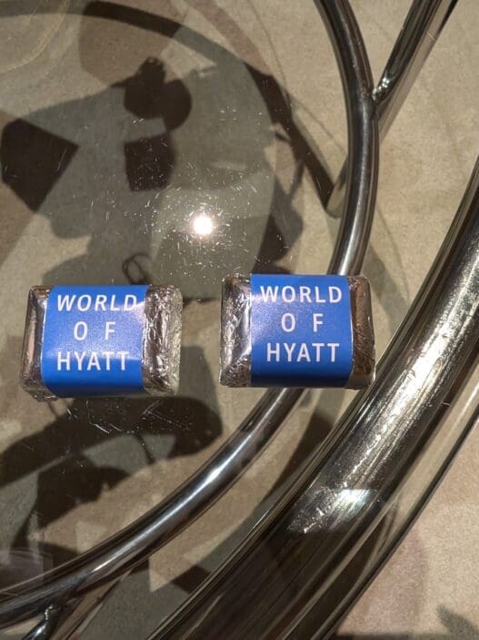 two small rectangular objects on a glass table