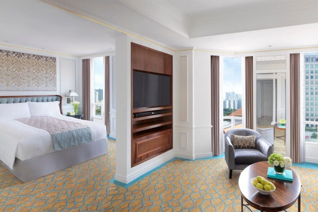 a room with a bed and a tv