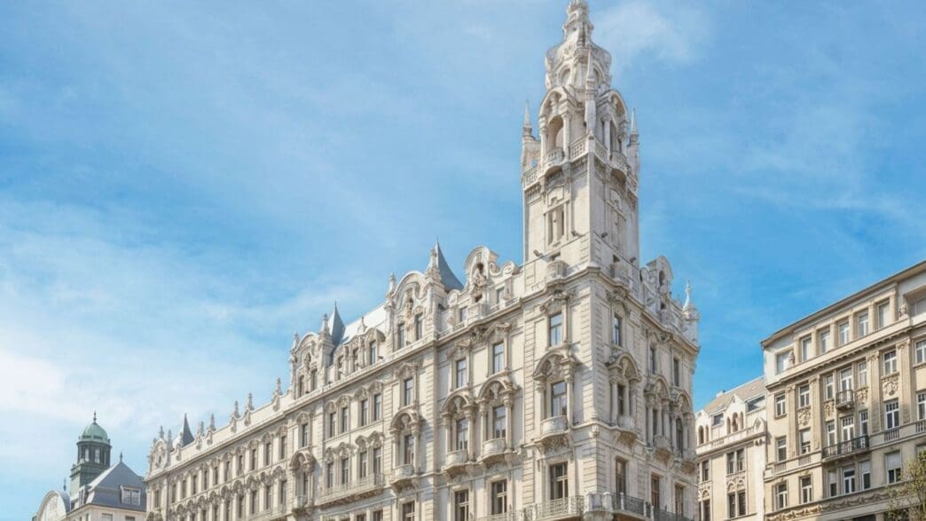 a large white building with a tower