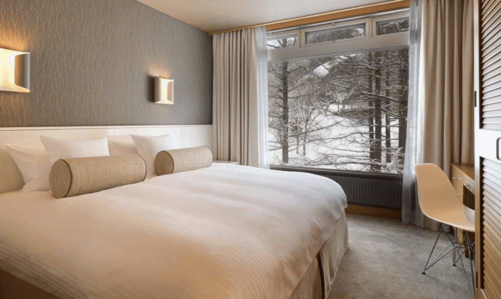 a bed with a large window