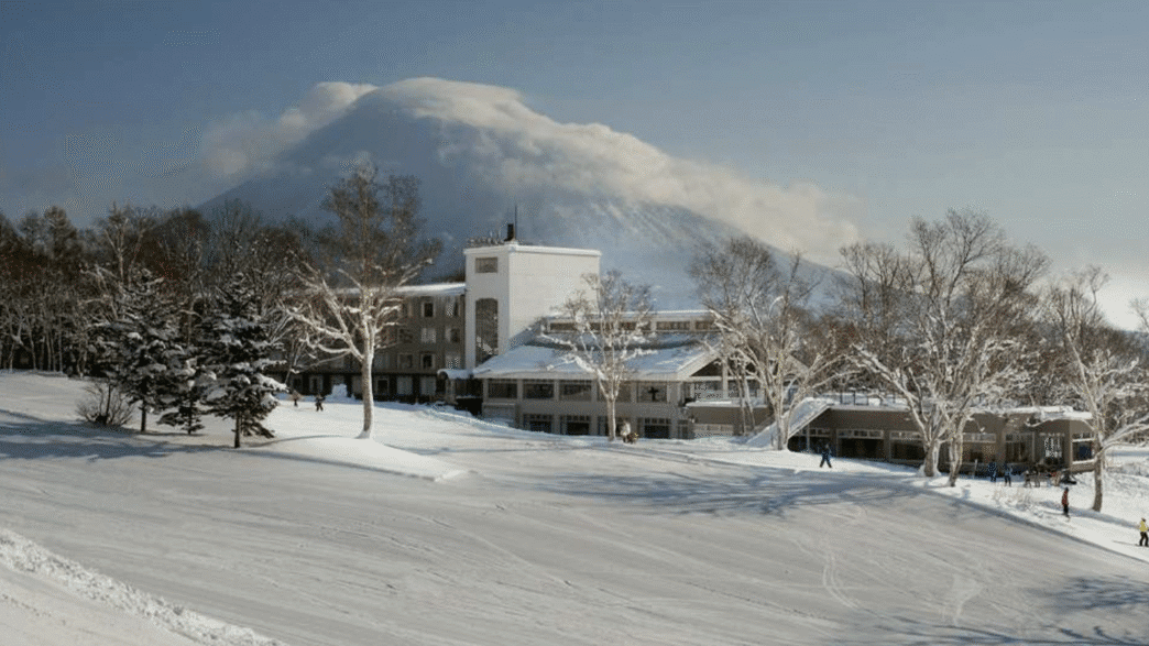 a building with snow on the ground