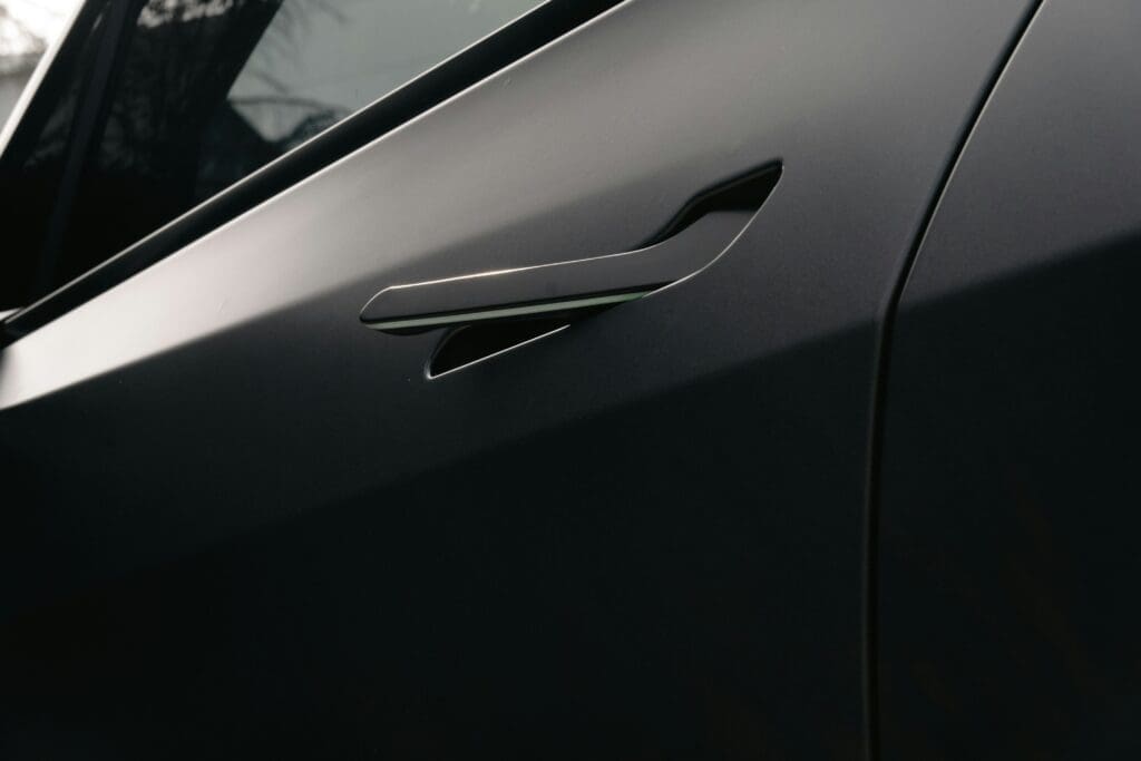a close up of a car door handle