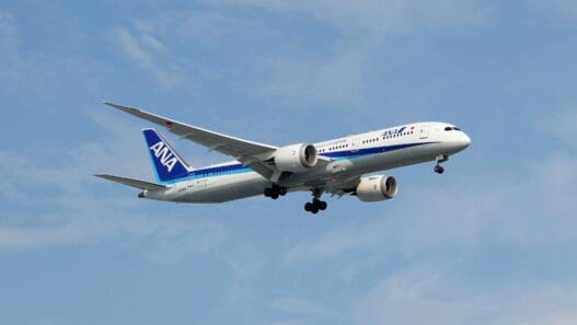 a plane flying in the sky