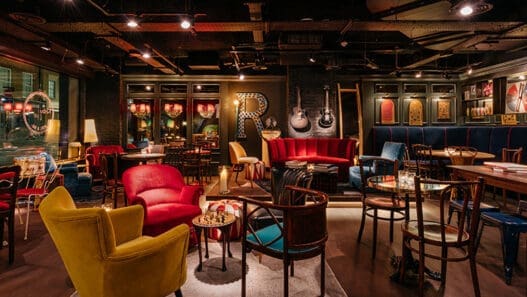 a room with chairs and tables