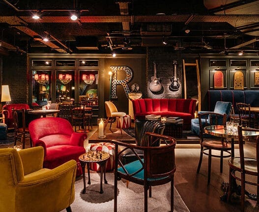 a room with chairs and tables