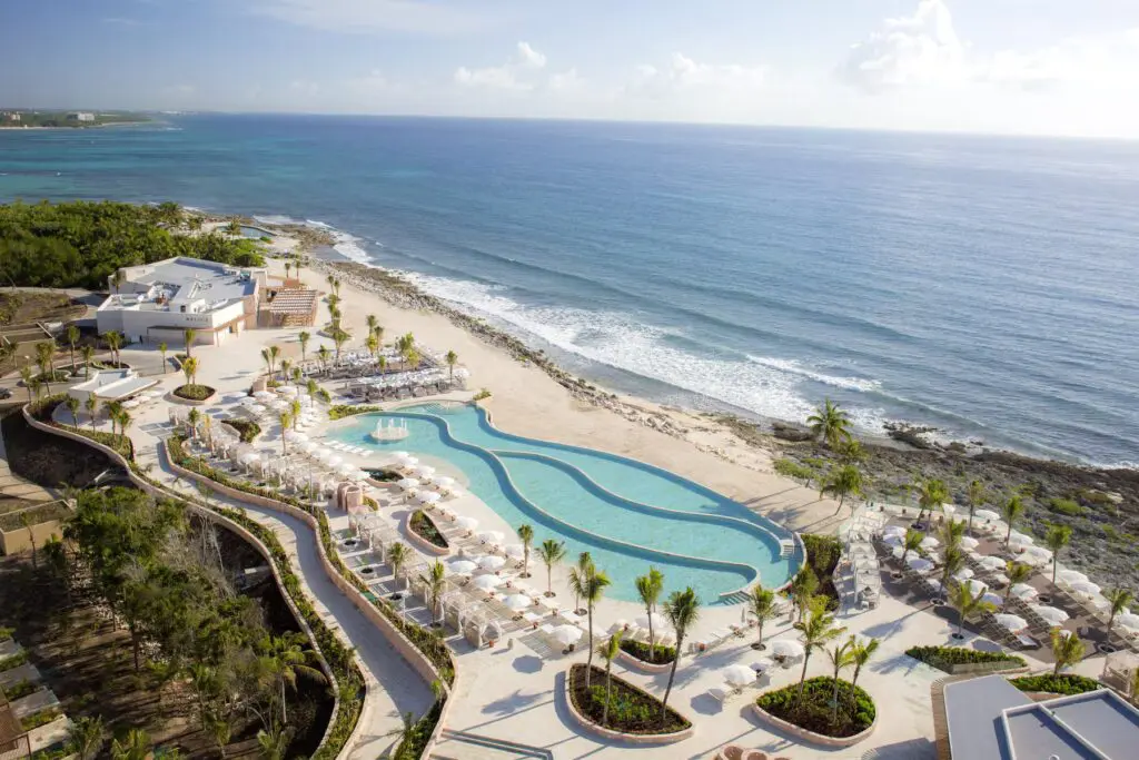 a swimming pool on a beach