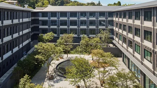 a building with trees around it