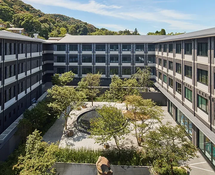 a building with trees around it