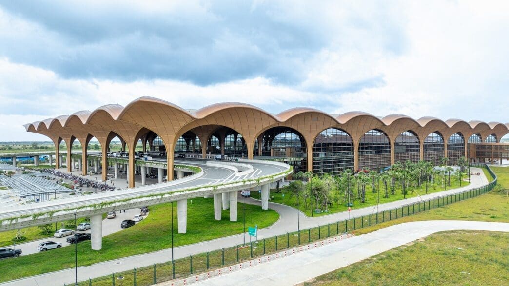 a large building with curved roof