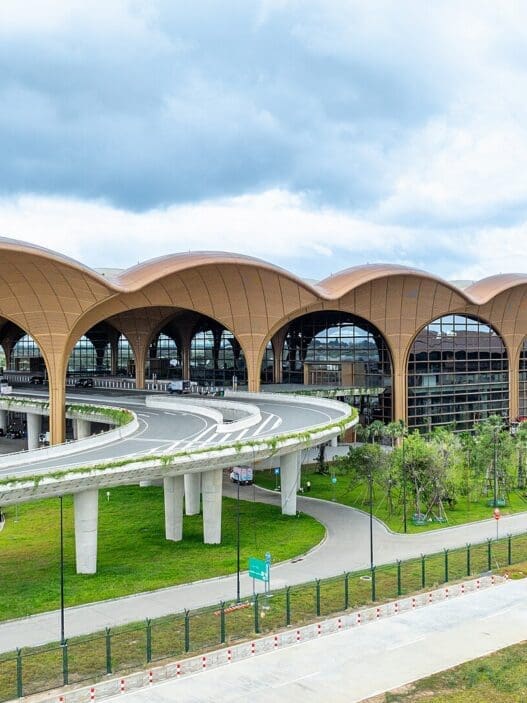 a large building with curved roof