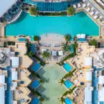 a swimming pool with a pool in the middle of it