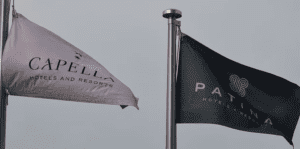 a black and white flag on a pole