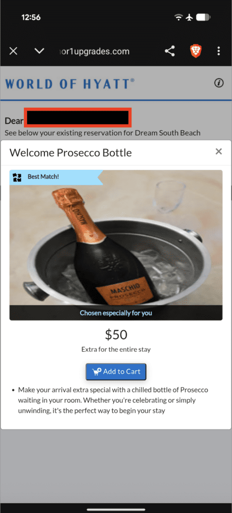 a screenshot of a bottle of champagne in a bucket of ice