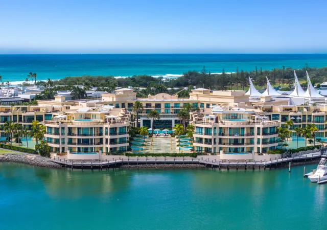 a large building with a body of water