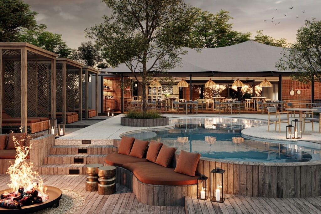 a pool with a couch and a gazebo