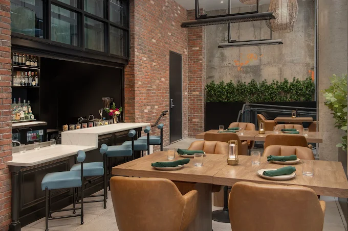 a room with tables and chairs