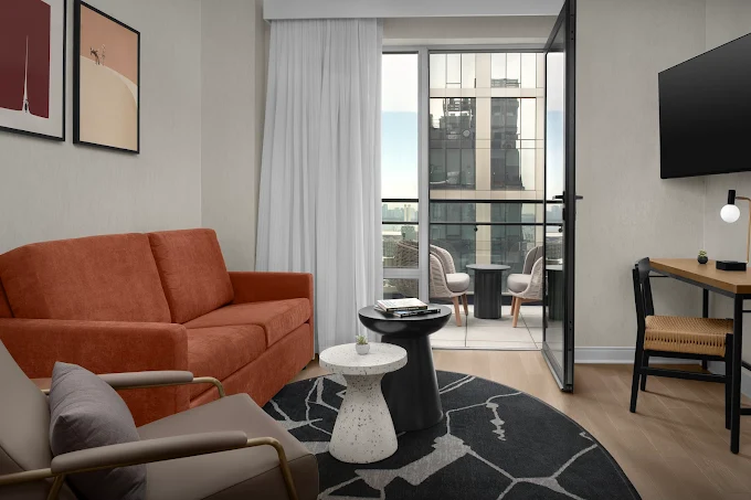 a living room with a couch and a table