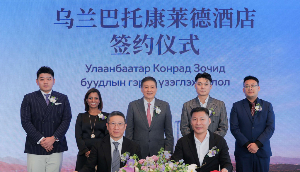 a group of people posing for a photo