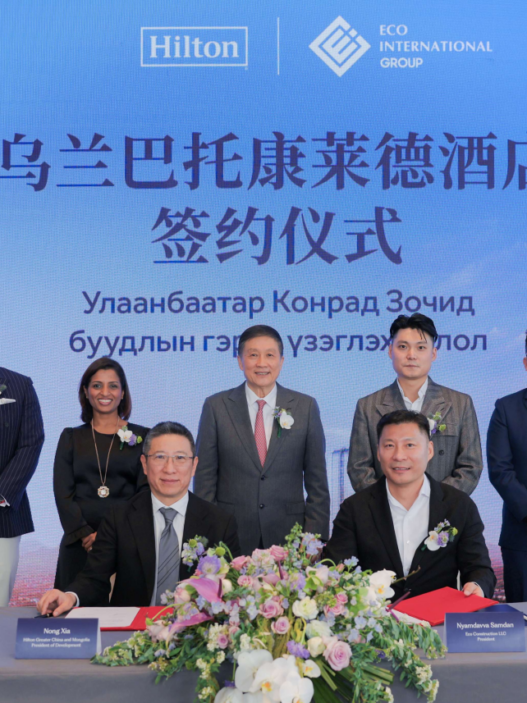 a group of people posing for a photo