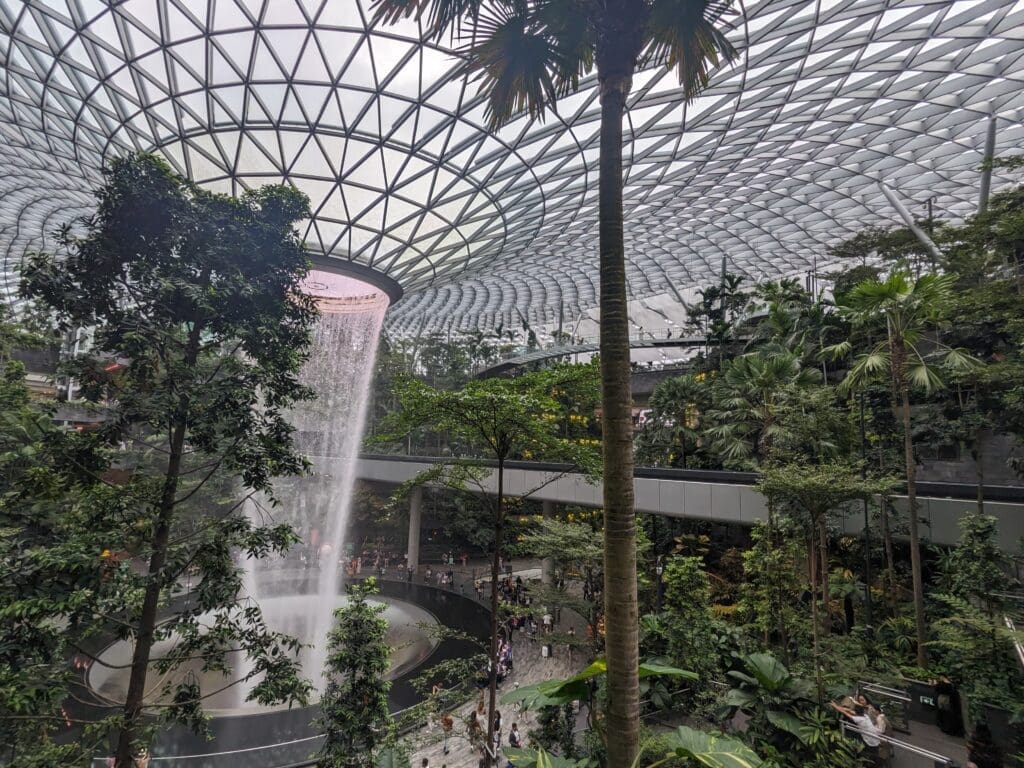 a waterfall in a glass dome