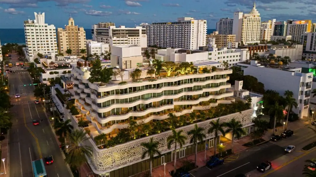 a large building with trees on top of it