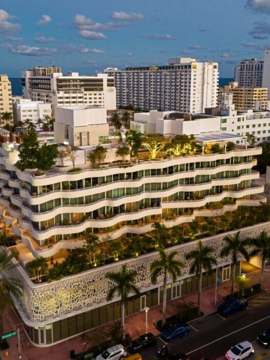 a large building with trees on top of it