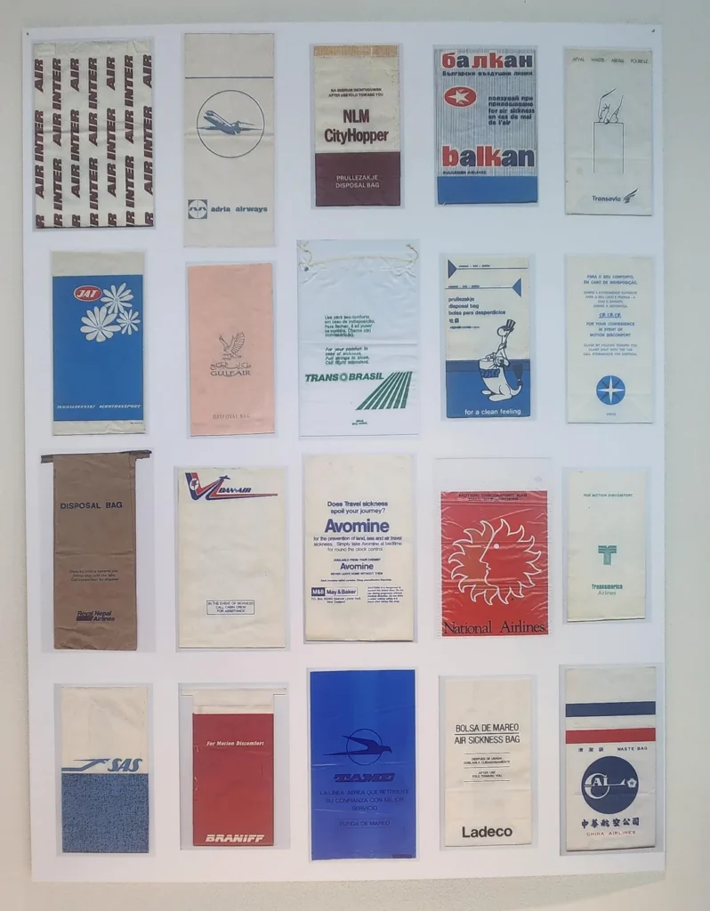 a group of paper bags on a wall