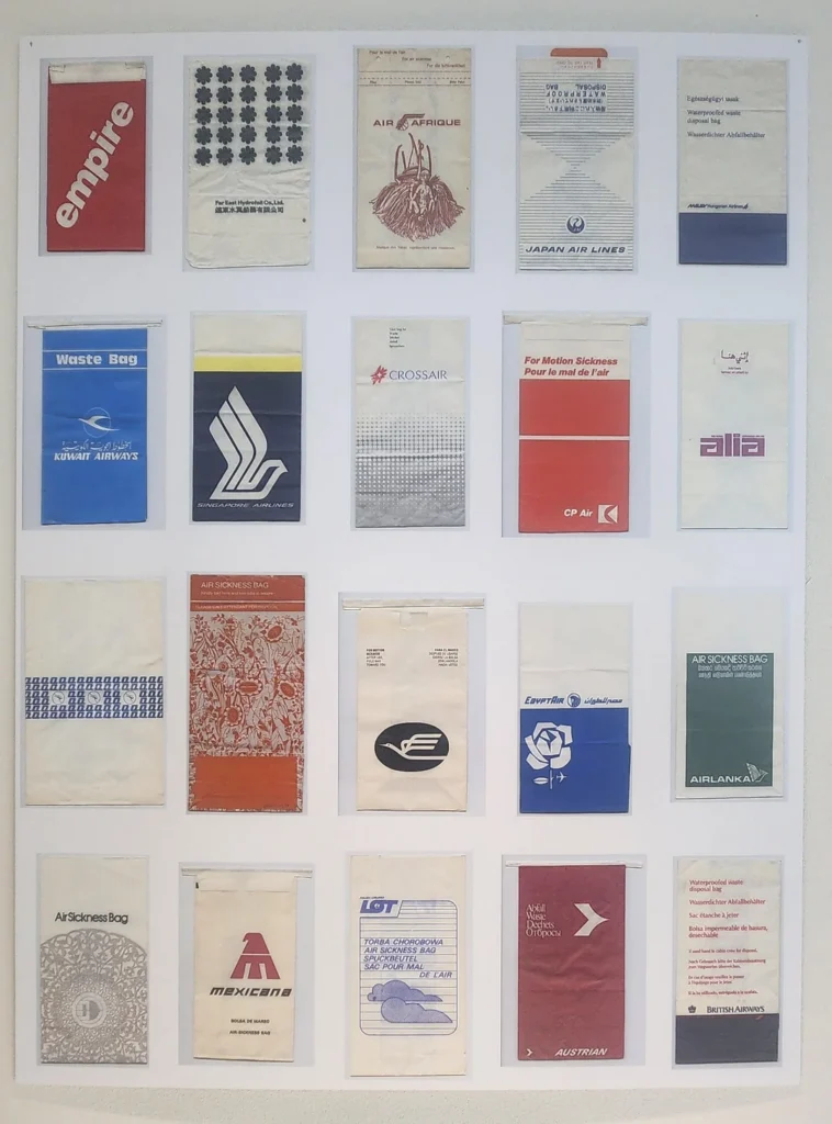 a group of paper bags on a wall