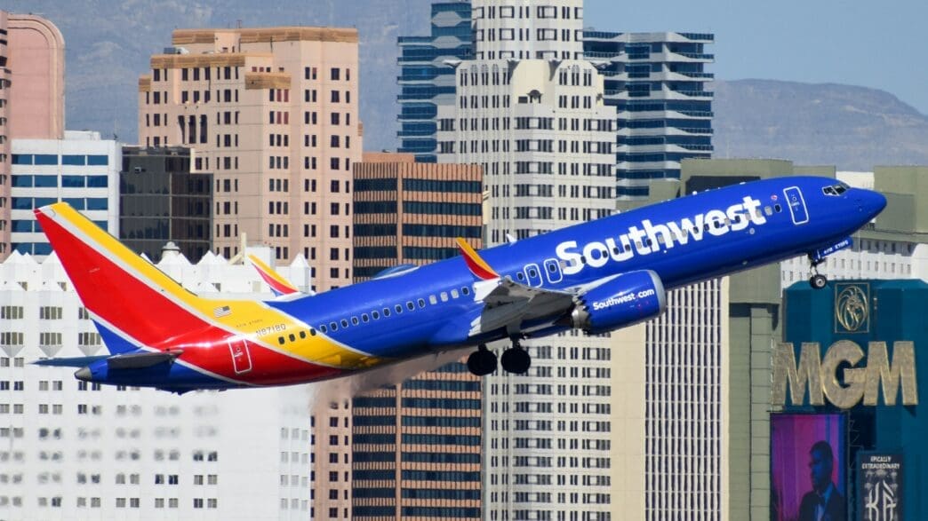 a plane flying over a city