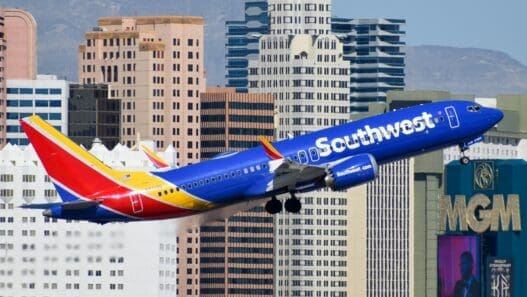 a plane flying over a city