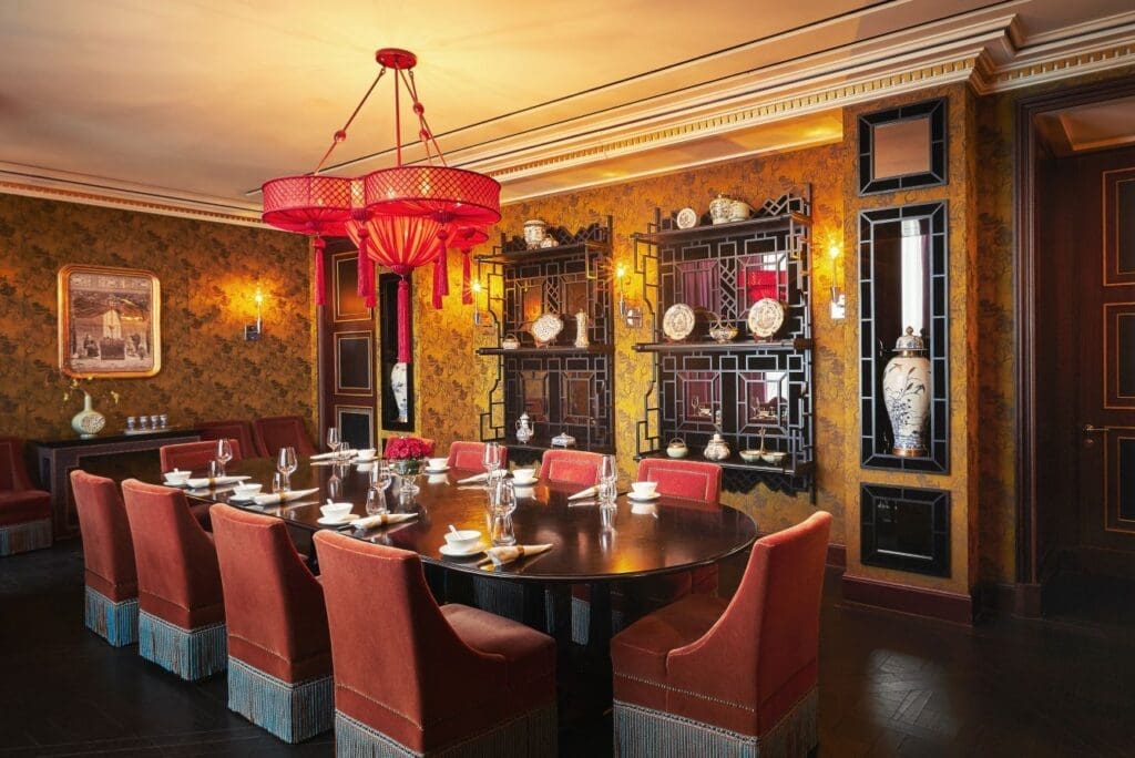 a room with a table and chairs