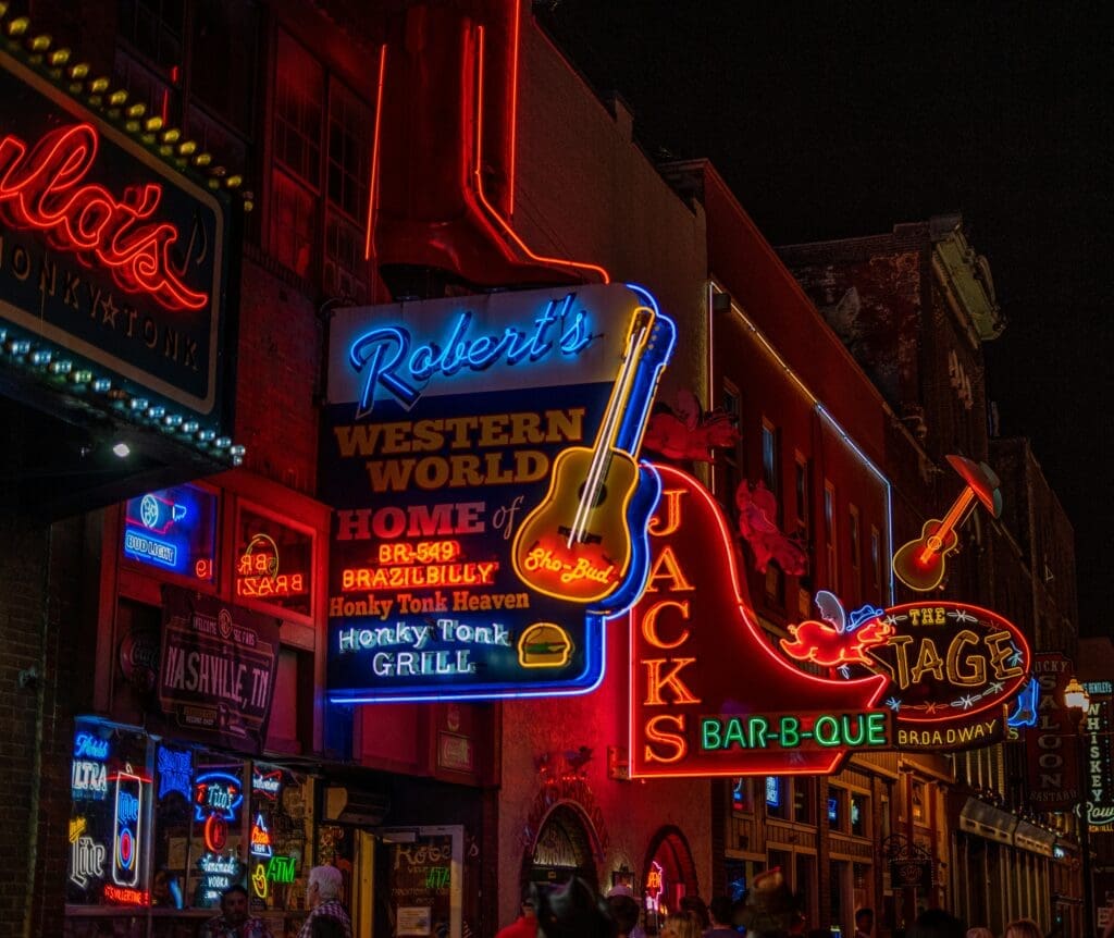 a neon signs on a city street