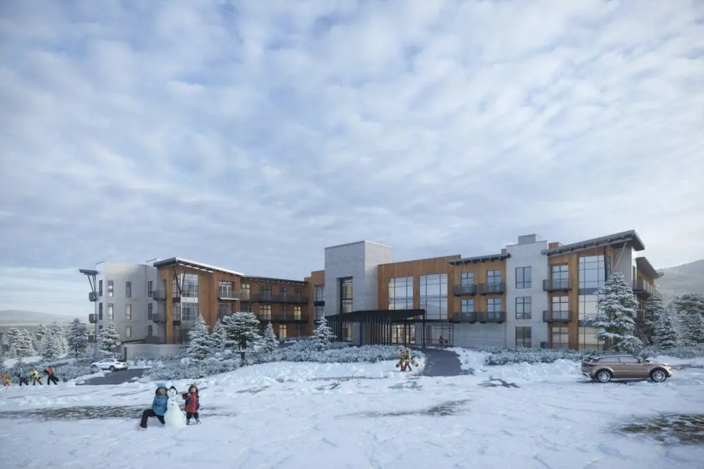 a building with snow and trees
