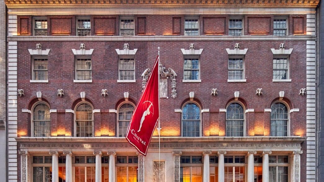 a building with a flag on the front