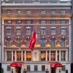 a building with a flag on the front