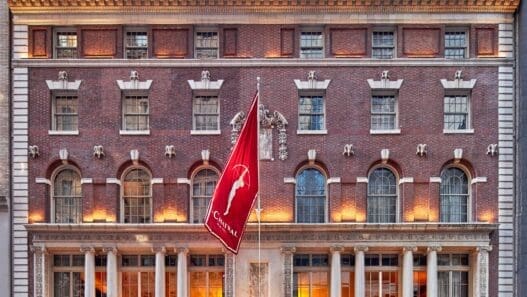 a building with a flag on the front