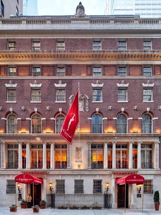a building with a flag on the front