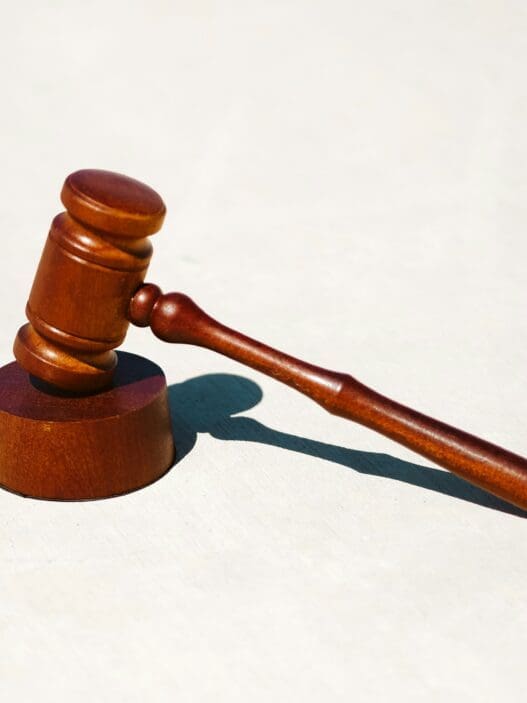 a wooden gavel on a stand